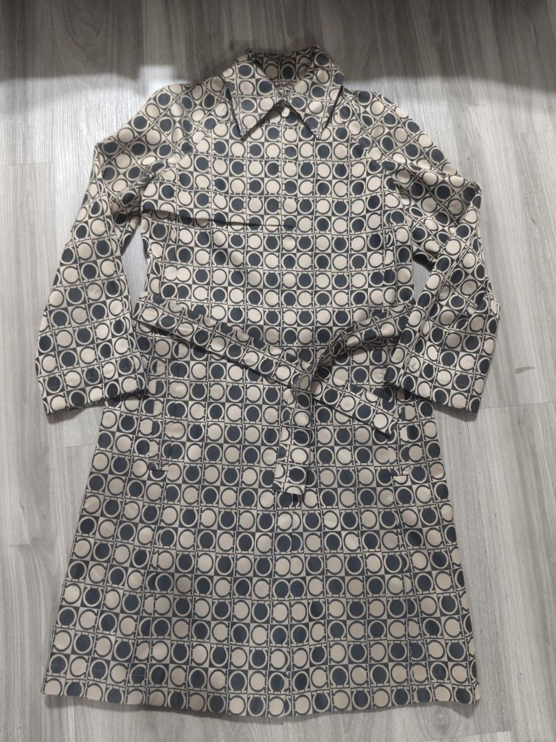 Salvatore Ferragamo Monogrammed Button-Up Dress (Category: Dresses) located in San Mateo. Submitted by roxyj120919 (Listing ID 1464264365, Image 1). Description: - Authentic Salvatore Ferragamo Dress - Iconic Gancini Monogram Print All Over - Button-Up Front with Collar - Made in Italy - Size: 38 IT / 4 US - Perfect for a Classic and Elegant Look.