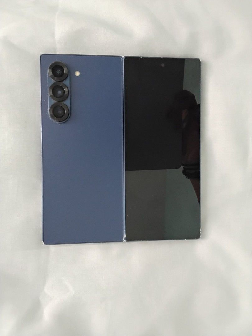 Samsung Galaxy Z Fold 6 (Category: Samsung) located in Calamba. Submitted by maxshey07 (Listing ID 1464187493, Image 2). Description: 256GB Dark blue color Good condition Small scratches in sides of phone Need to replace inner screen protector Price is NEGOTIABLE.