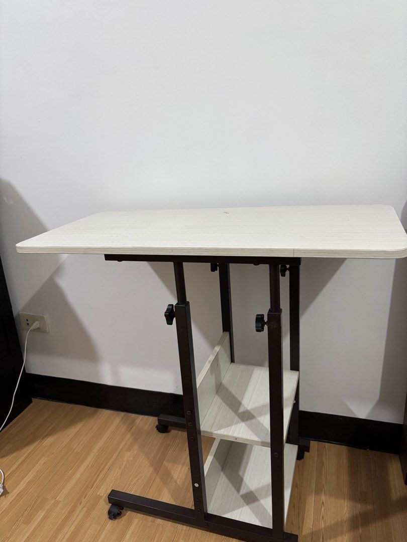 Sanyang Adjustable Height Office / Study Table (Category: Tables & Sets) located in Muntinlupa City. Submitted by loisaaaa (Listing ID 1464291852, Image 3). Description: 💰 ₱900 ONLY — still negotiable! ✅ Adjustable height ✅ Good working condition ✅ Suitable for office, study, or work-from-home setup ⚠️ Need lang palitan ang gulong/wheels, but otherwise all goods po ang table. 📩 PM lang po for inquiries!.