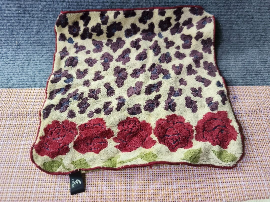 Set of 4 Assorted Patterned Handkerchiefs/Small Towels (Category: Handkerchief & Pocket Squares) located in San Leonardo. Submitted by burgossanleonardo.12345 (Listing ID 1464182238, Image 2). Description: - Set of 4 assorted handkerchiefs or small towels. - Designs include: floral rose pattern, deep blue tie-dye, cream with embroidered crest, and cream with embroidered initials. - Versatile: suitable for everyday use or as decorative accents..