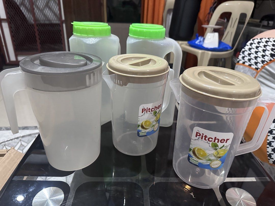 Set of 5 Plastic Pitchers with Lids (Category: Pitchers & Dispensers) located in Manila. Submitted by zuripot0726 (Listing ID 1464285279, Image 1). Description: - Set of 5 plastic pitchers - 2 pitchers with green lids - 2 pitchers with beige lids - 1 pitcher with gray lid - Easy-pour handles for convenient use - Ideal for water, juice, iced tea, and other beverages - Great for parties and everyday use.