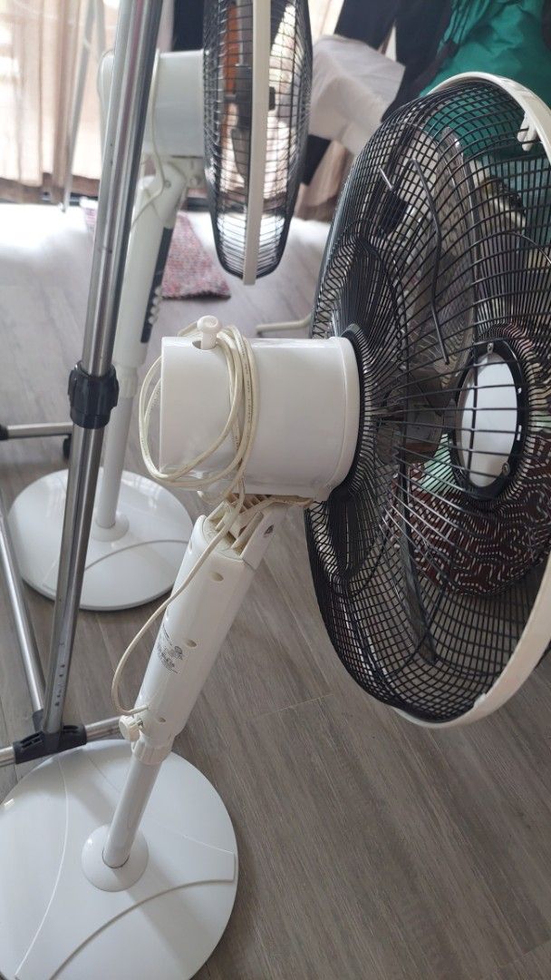 Sharp Electric Stand Fan PJ-S16 (Category: Fans) located in Paranaque City. Submitted by daddyu (Listing ID 1464177518, Image 3). Description: - Set of 2 Sharp Electric Stand Fans - Model: PJ-S16 - Size: 16-inch (40cm) - Color: White with Black Grilles - Features: 3 Speed Settings, Oscillation Function - Power Consumption: 50W - Perfect for keeping your room cool IK each Fan Issue: Minsan mag stop ang ikot pro bumabalik nman. Saglit lang nagamit 