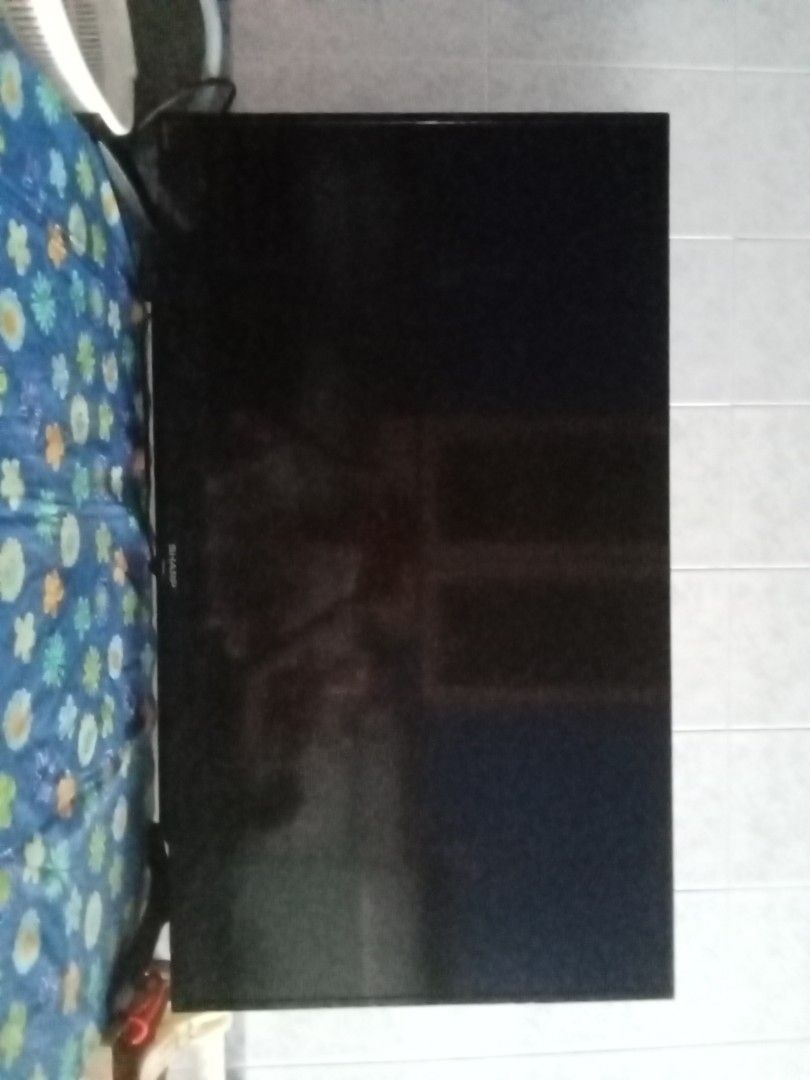 Sharp TV (Category: TV) located in Singapore. Submitted by rgflower (Listing ID 1464233786, Image 2). Description: - Sharp television - Clear picture quality when on - Perfect for movies and shows - Comes with original stand - Ready for a new home.