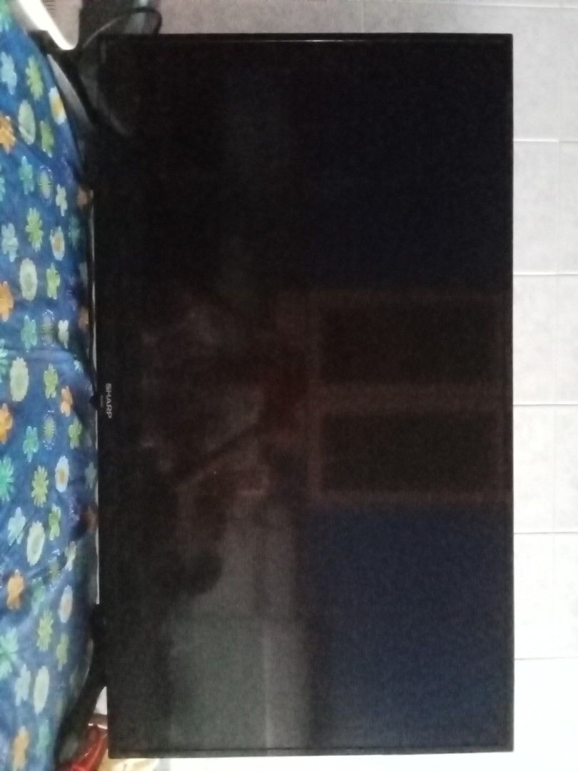 Sharp TV (Category: TV) located in Singapore. Submitted by rgflower (Listing ID 1464233786, Image 1). Description: - Sharp television - Clear picture quality when on - Perfect for movies and shows - Comes with original stand - Ready for a new home.