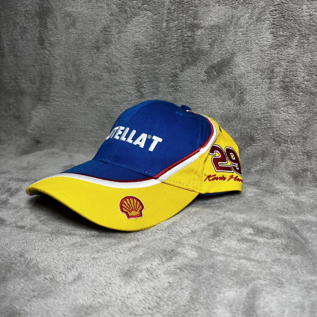 Shell Rotella NASCAR Racing Cap (Category: Caps & Hats) located in Manila. Submitted by thrifted4life (Listing ID 1464267212, Image 2). Description: - Blue and yellow Shell Rotella racing cap - Features iconic Shell logo and '29' graphic - Adjustable strap for a comfortable, custom fit - Made from 100% breathable cotton - One size fits most - Ideal for any motorsports or Shell enthusiast.