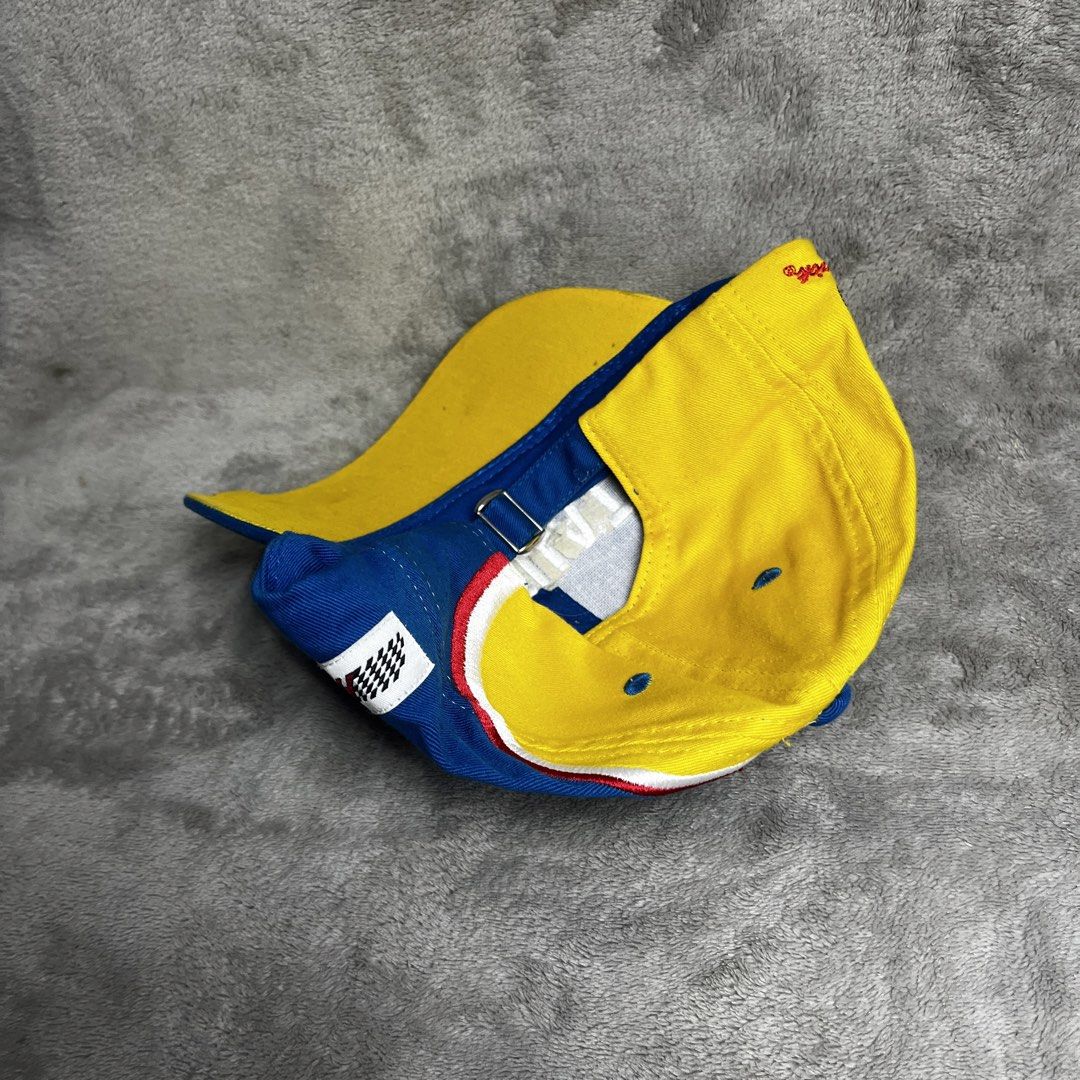 Shell Rotella NASCAR Racing Cap (Category: Caps & Hats) located in Manila. Submitted by thrifted4life (Listing ID 1464267212, Image 3). Description: - Blue and yellow Shell Rotella racing cap - Features iconic Shell logo and '29' graphic - Adjustable strap for a comfortable, custom fit - Made from 100% breathable cotton - One size fits most - Ideal for any motorsports or Shell enthusiast.