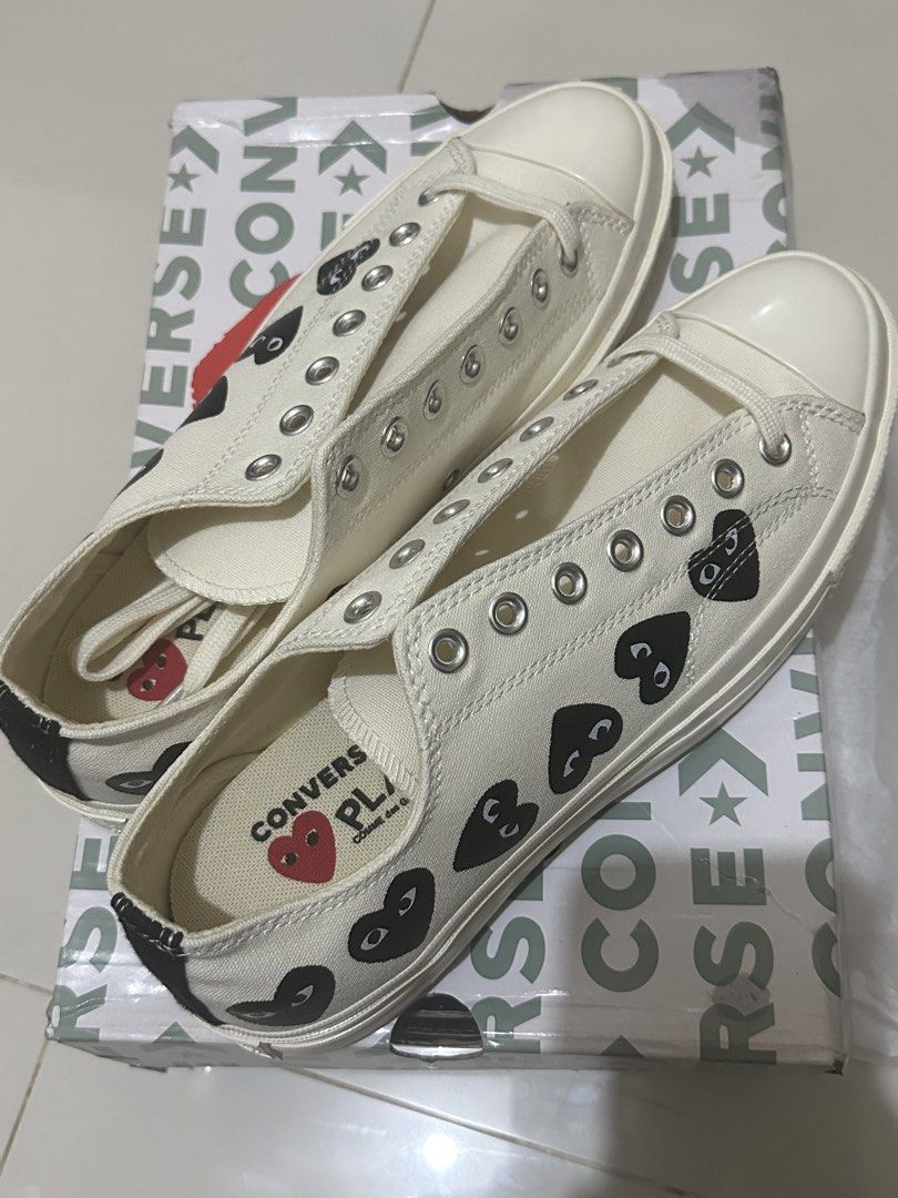 Shoes (Category: Casual Shoes) located in Manila. Submitted by garciajake (Listing ID 1464254808, Image 3). Description: For Sale‼️ COMME des GARÇONS PLAY x Converse Chuck 70 Low Top in the Multi-Heart / All-Over Print colorway (Off-White/Milk/Egret with black hearts). Highest quality .