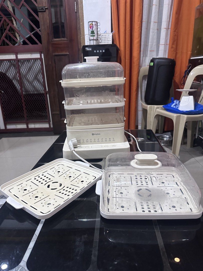 Simplus 3-Tier Electric Food Steamer (Category: Cookers) located in Manila. Submitted by zuripot0726 (Listing ID 1464265649, Image 1). Description: - Simplus 3-tier electric food steamer - Digital display on base unit - Multiple timer settings (eggs, seafood, vegetables, etc.) - Includes all 3 steaming baskets and lid, and extra steaming trays and a lid - Perfect for healthy and convenient cooking - Fully functional ⚠️ needs cleaning ⚠️ cover of 