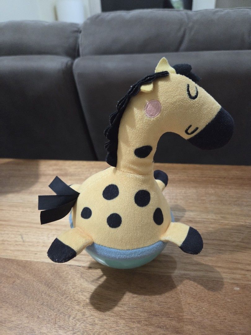 Skip Hop Giraffe Balancing Toy (Category: Plushies & Soft Toys) located in Taguig. Submitted by bbbautista (Listing ID 1464199760, Image 3). Description: Cute Skip Hop giraffe plush toy. Yellow with black spots. Has a crinkle sound when squeezed. Great for babies and toddlers. Easy to hold and play with. Perfect for tummy time or on-the-go fun..