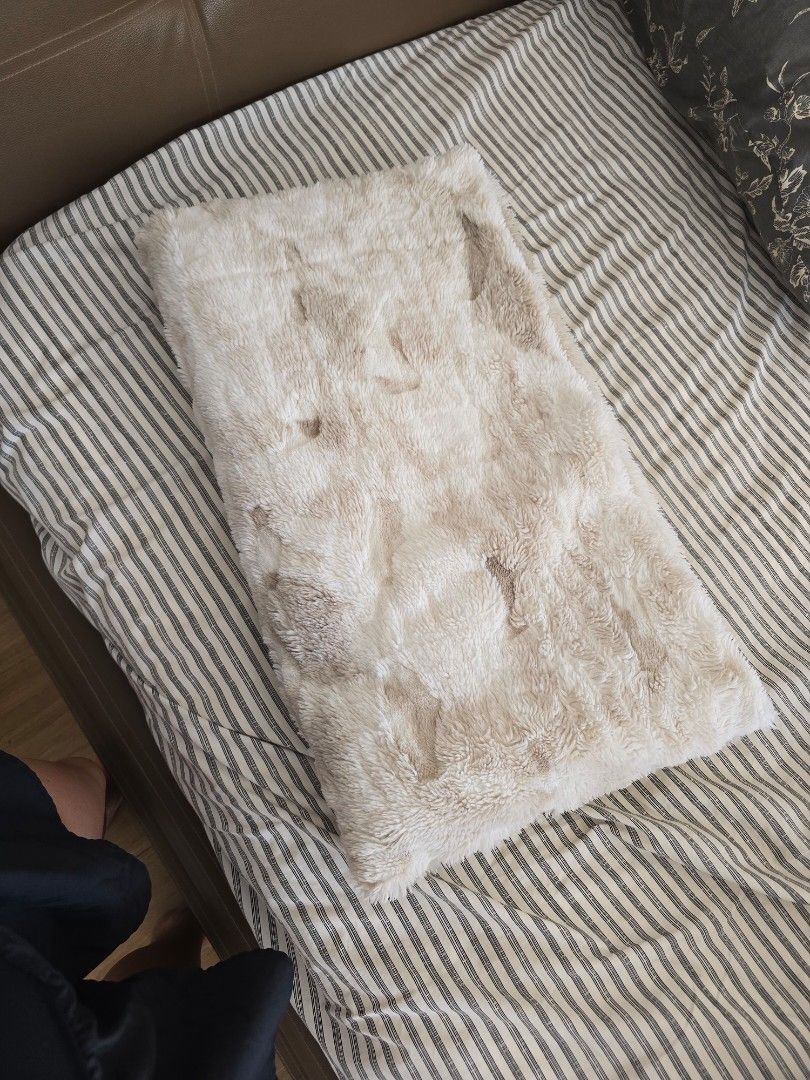 Soft Cream Faux Fur Throw Blanket (Category: Bedding & Towels) located in Paranaque City. Submitted by incognitopawikan (Listing ID 1464155399, Image 1). Description: - Super soft and cozy faux fur throw blanket - Creamy beige color with subtle darker markings - Ideal for snuggling on the couch - Adds a warm layer to your bed - Easy to care for - Perfect for chilly evenings.