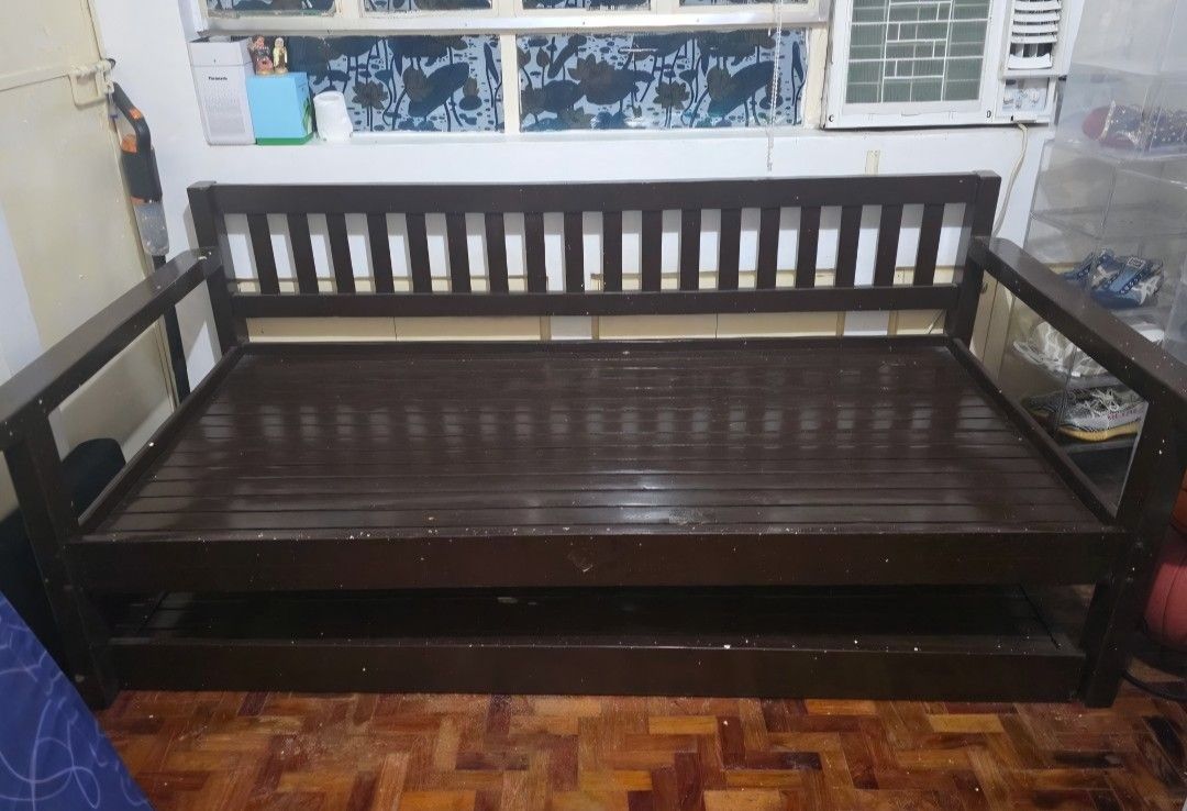 Solid wood Day bed sofa bed with pull out bed (Category: Bed Frames & Mattresses) located in Manila. Submitted by jansenica (Listing ID 1464311666, Image 1). Description: Solid wood Day bed Frame with Pull out bed total of 2 bed frame Super Size size 47x 74.5cm ortigas pasig.