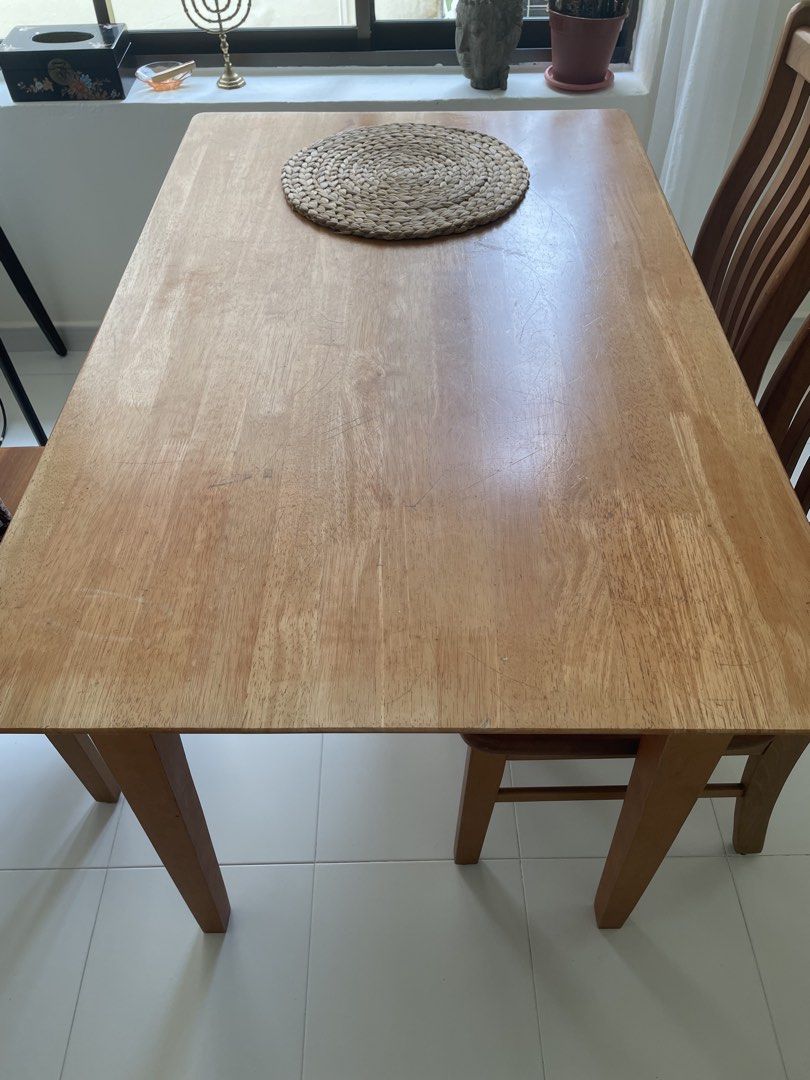 Solid Wood Dining Table (Category: Tables & Sets) located in Singapore. Submitted by shana111 (Listing ID 1464180003, Image 1). Description: - made of solid wood - Simple, sturdy design - surface has scratches - Ready for immediate pickup.