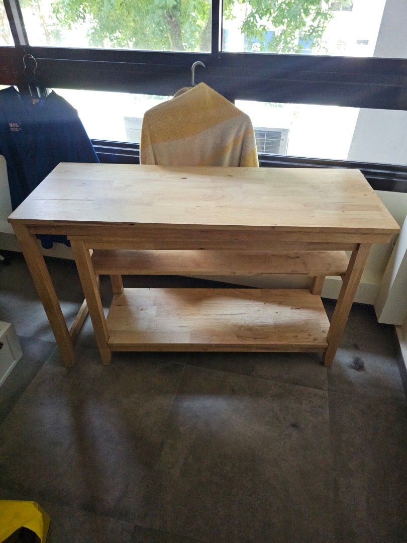 Solid Wood table (Category: Tables & Sets) located in Singapore. Submitted by monstermosh (Listing ID 1464198272, Image 2). Description: Size: L1200/1920 x D/W450 x H735 mm Weight: 29 kg Wood Color: Raw Natural Material: Solid Hevea wood (also known as rubberwood) with natural woodknot Configurable as an L-shape or straight layout to suit your space. Folds into a compact console table when not in use. Letting go for $80. Negotiable Arrange own tr