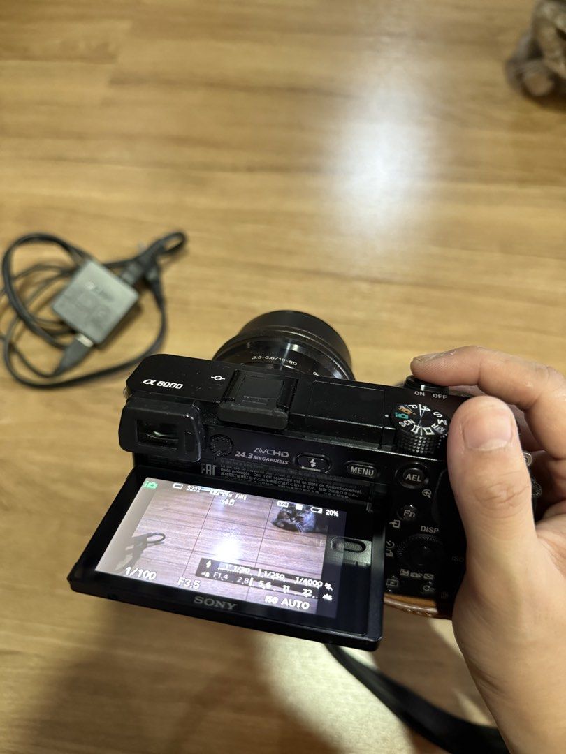 Sony Alpha a6000 Mirrorless Camera with 16-50mm Lens (Category: Cameras) located in Quezon City. Submitted by choomichob (Listing ID 1464169041, Image 2). Description: - Sony Alpha a6000 mirrorless camera - Comes with 16-50mm lens - Includes charger - Brown leather case included - Quality Strap and extra battery also included - Great for both photos and videos RFS: hindi nagagamit.