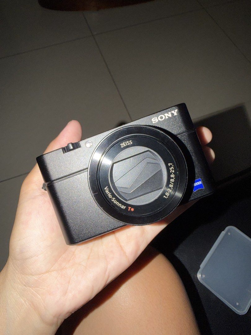Sony RX100 M4 (Category: Cameras) located in Cebu City. Submitted by dumplings.foryou (Listing ID 1464284126, Image 3). Description: Note ‼️ • Comes with a new NP-BX1 battery pack (worth almost 3k) and 2 extra batteries • Comes with micro usb-type C cable to charge with latest adaptors (not sony brand) • Comes with cute KBP pouch from korea • Does not come with original box (already discarded) • Has been brought to sony repair centre once for xen