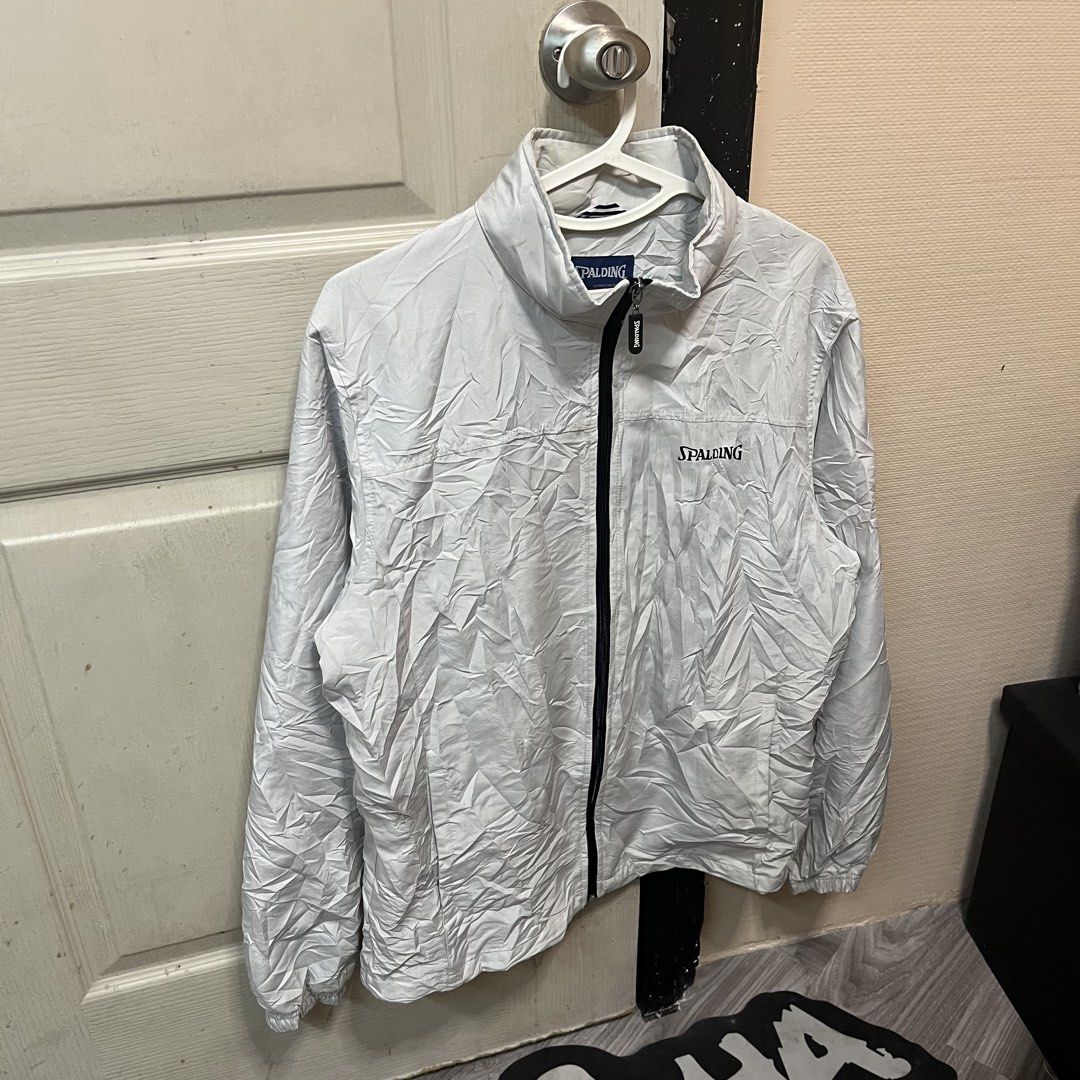 Spalding | Windbreaker (Category: Coats, Jackets and Outerwear) located in Quezon City. Submitted by giometryyy (Listing ID 1464228002, Image 1). Description: 26 x 22 Medium grayish white excellent condition quality material inner mesh 📍East Fairview, QC 🛵 Lalam0ve / JnT 💰Payment first .