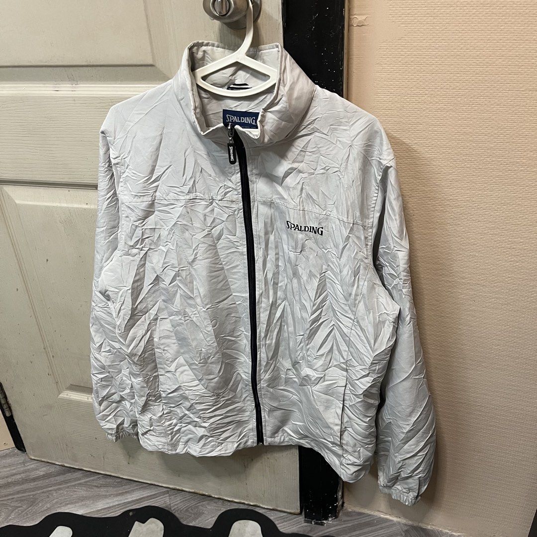 Spalding | Windbreaker (Category: Coats, Jackets and Outerwear) located in Quezon City. Submitted by giometryyy (Listing ID 1464228002, Image 2). Description: 26 x 22 Medium grayish white excellent condition quality material inner mesh 📍East Fairview, QC 🛵 Lalam0ve / JnT 💰Payment first .
