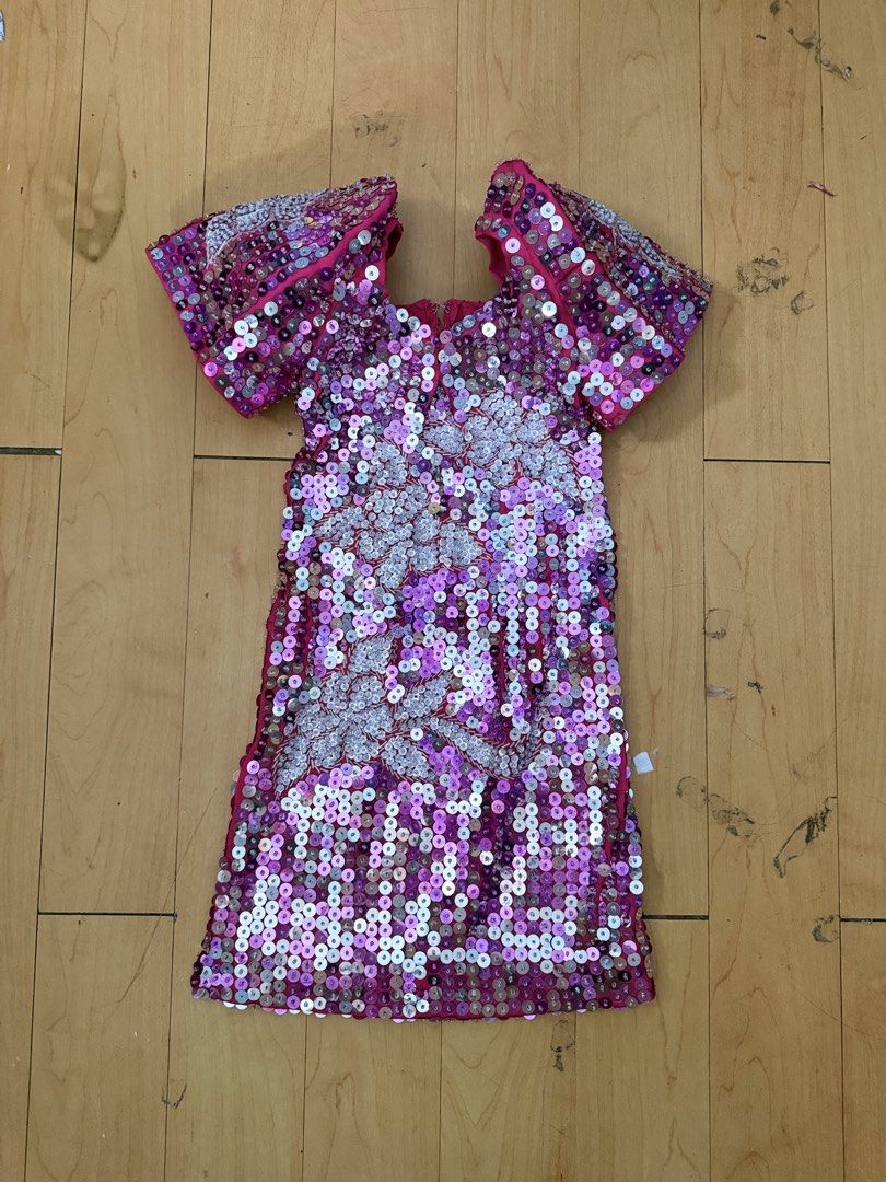 Sparkly Sequin Dress with Silver Embellishments (Category: Babies & Kids Fashion) located in Quezon City. Submitted by msmarjqab (Listing ID 1464149549, Image 1). Description: - Eye-catching pink and purple sequins all over - Silver floral embellishments on front and sleeves - Convenient back zipper closure - Length: 59cm - Ideal for parties, performances, or special occasions -butterfly sleeves, with slit on one side.