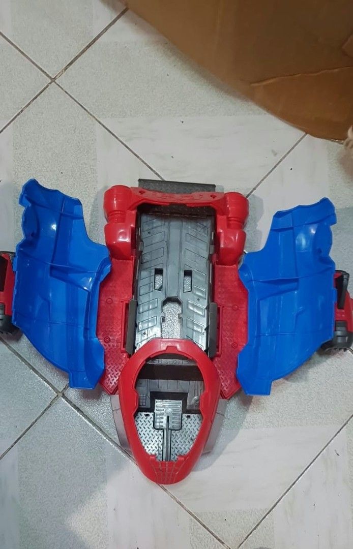 Spiderman Toy Jet Plane (Category: Vehicle & Diecast Models) located in Manila. Submitted by jhs31 (Listing ID 1464181868, Image 2). Description: - Cool Spiderman toy jet - Features red and blue colors - Wings can fold out - Has a compartment in the front - Ideal for Spiderman fans - Shows some scuff marks from play -SELLING AS IS -CROSSPOSTED .