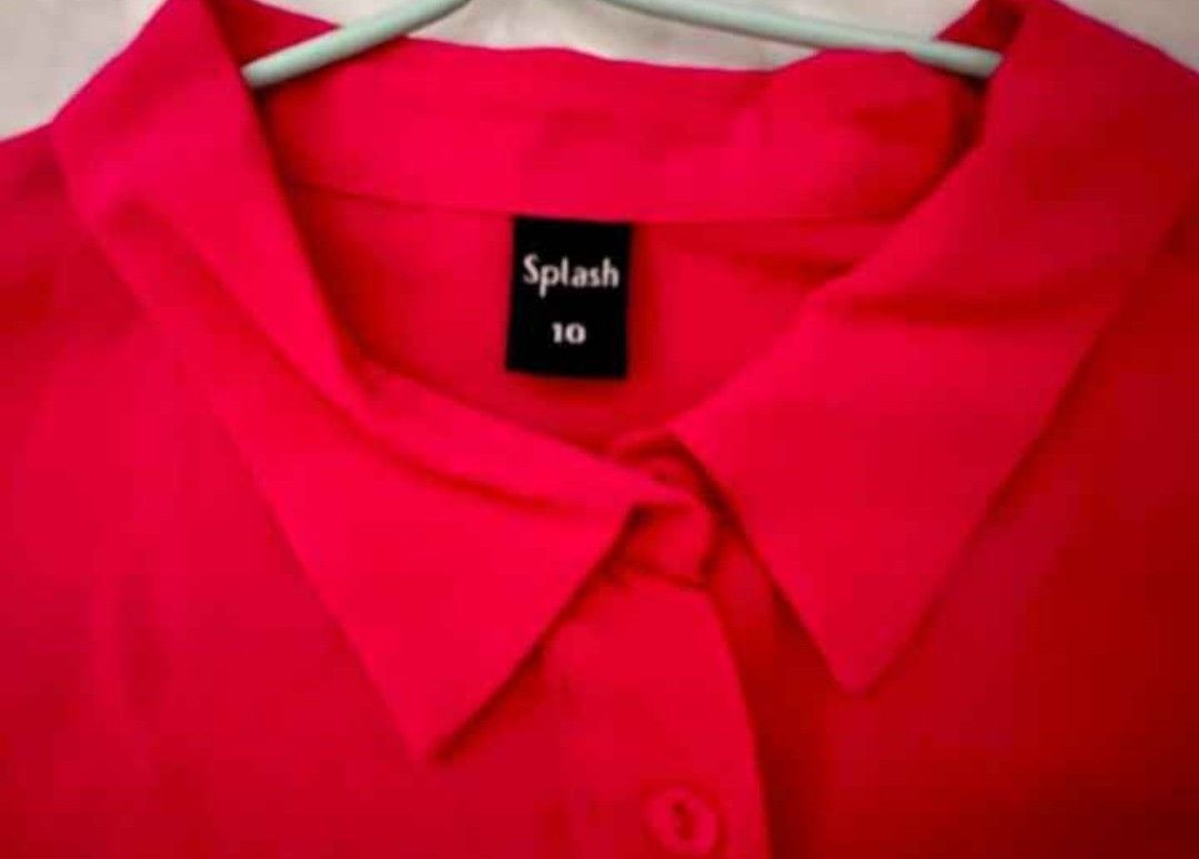 Splash Pink Long Sleeve Button Up Shirt (Category: Longsleeves) located in Manila. Submitted by jaysieseva620 (Listing ID 1464263037, Image 2). Description: - Pink long sleeve shirt - Brand: Splash - Button-up front with collar - Size: 10 - Perfect for casual outings or work attire - Pairs well with jeans or trousers.