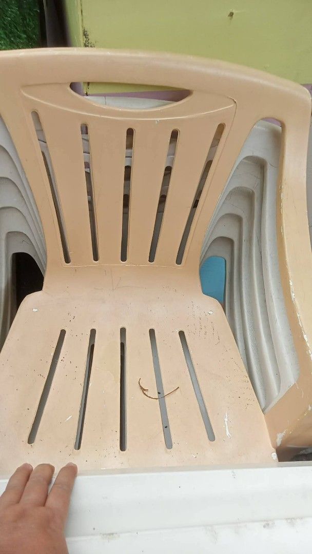 Stackable Plastic Chairs (Set of 6) (Category: Chairs) located in Quezon City. Submitted by madelrivera (Listing ID 1464164061, Image 2). Description: - Set of 6 stackable plastic chairs - Colors: Beige and White - Suitable for indoor or outdoor use - Minor scuffs and dirt from storage, but still sturdy and functional - Ideal for events or as extra seating.
