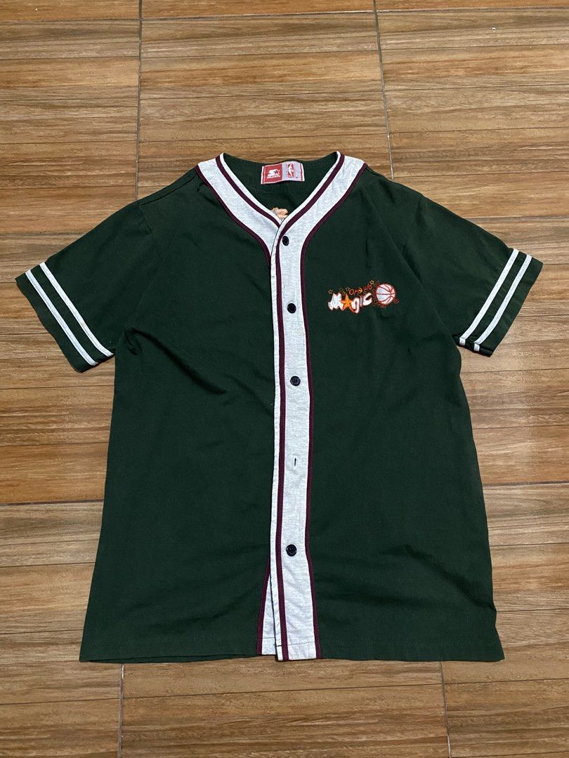 Starter NBA Orlando Magic Baseball Jersey (Category: Activewear) located in Baguio. Submitted by arenzu (Listing ID 1464302714, Image 1). Description: - Authentic Orlando Magic Green Starter Jersey - Features iconic team logo on the front - Classic button-up style with stylish contrast trim - NBA and Starter logos clearly visible - A must-have for any basketball enthusiast.