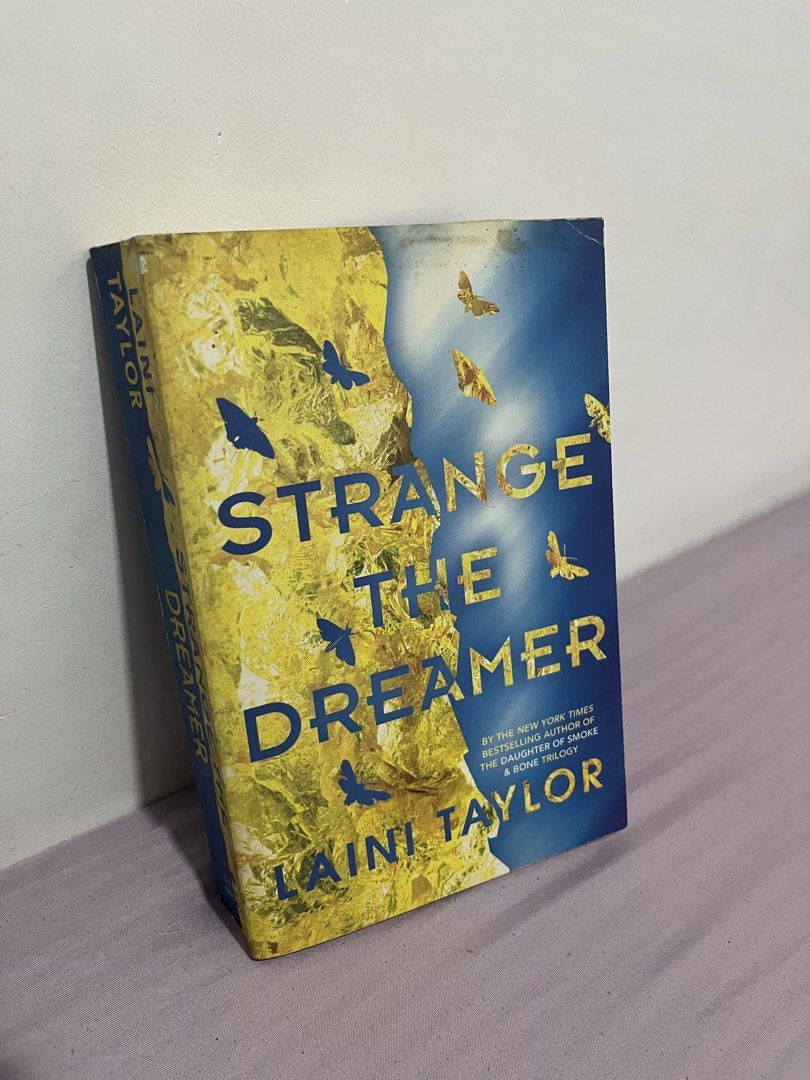 Strange the Dreamer by Laini Taylor Paperback (Category: Storybooks) located in Makati City. Submitted by sukidawa (Listing ID 1464267394, Image 1). Description: - Paperback copy of Strange the Dreamer by Laini Taylor - Author of the Daughter of Smoke & Bone trilogy - Cover shows minor wear - Ideal for fans of intricate world-building and compelling characters.