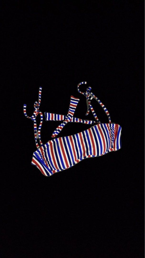 Striped Bikini Top - Red, White, Blue (Category: Bikinis & Swimsuits) located in Cavite. Submitted by zyrahramos (Listing ID 1464313332, Image 1). Description: 💋Adorable red, white, and blue striped bikini top. 💋Adjustable tie closure at the neck and back for a perfect fit. 💋Features padded cups for added support and shape. 💋Ideal for beach days, pool parties, or your next getaway!.
