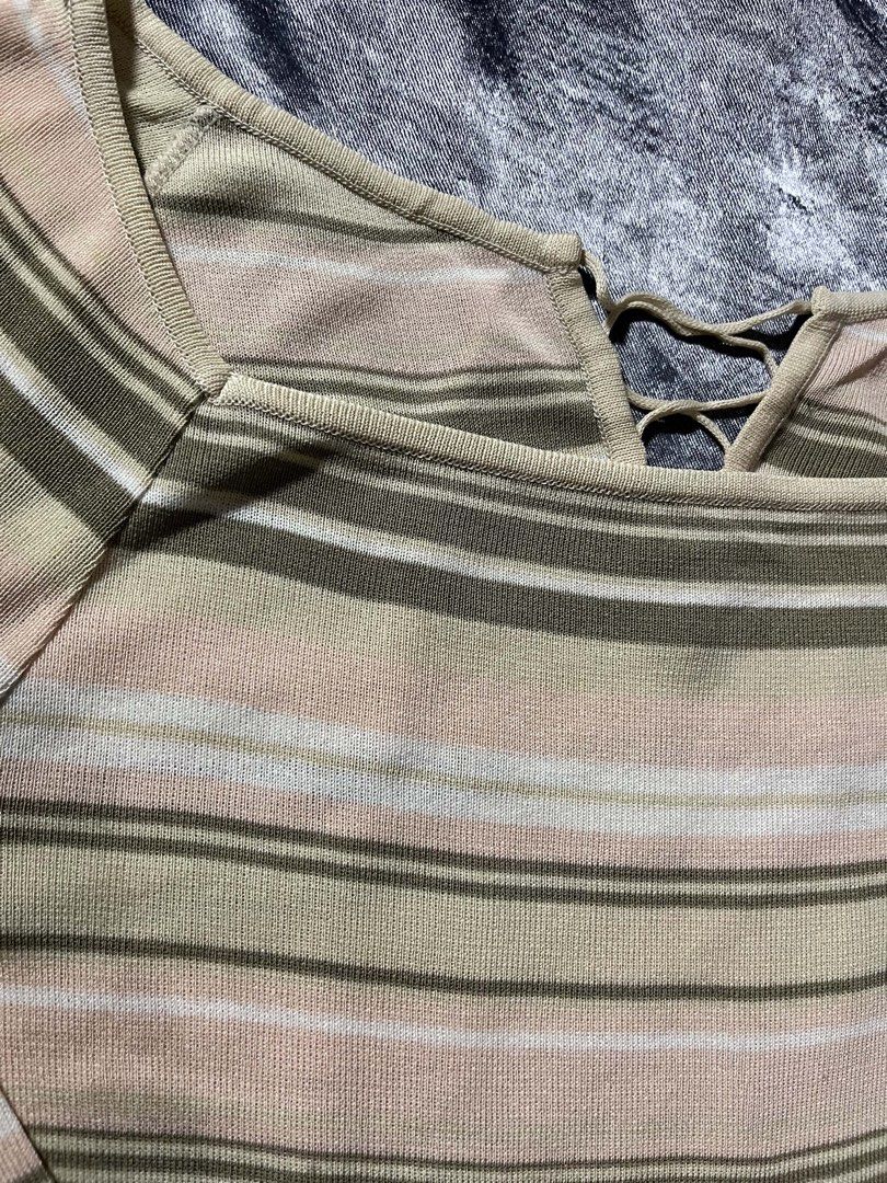 Striped Long Sleeve Top with Lace-Up Back (Category: Coats, Jackets and Outerwear) located in General Trias. Submitted by kevinthriftshop (Listing ID 1464278540, Image 3). Description: - Cute long sleeve top - Unique lace-up detail at the back neckline - Stripes in pink, green, and cream - Ribbed knit fabric - Versatile for casual or dressed-up outfits.