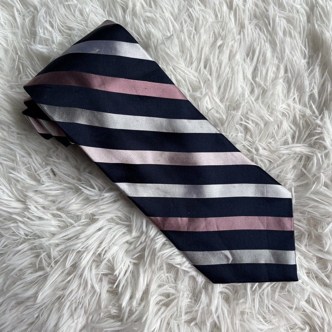 Striped Necktie - Navy, Pink, Silver (Category: Ties) located in Cuyapo. Submitted by Ashtyn.Pre.Loved (Listing ID 1464257412, Image 1). Description: - Classic striped tie - Colors: Navy blue, soft pink, silver - Versatile: Ideal for formal occasions or dressing up casual outfits - Adds a pop of color.