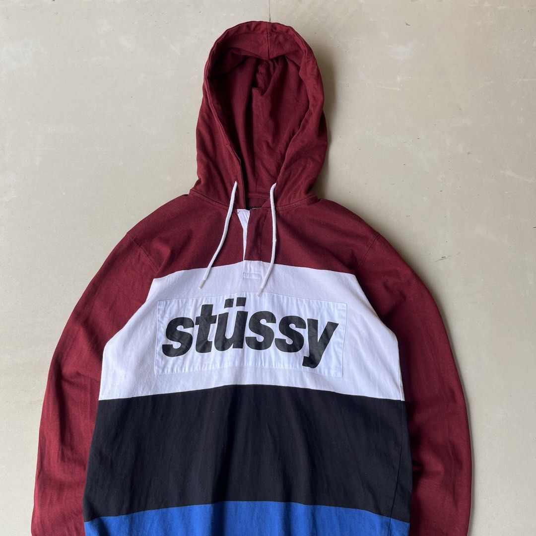 Stussy Colour Block Hoodie Size M (Category: Coats, Jackets and Outerwear) located in Mandaue City. Submitted by chinsyap_03 (Listing ID 1464190889, Image 2). Description: - Stussy Hoodie - Size: Medium (M) - Design: Color block with maroon sleeves and hood - Accents: White, black, and blue panels - Features: Stussy logo on the front, drawstring hood - Origin: Made in India - Condition: Great.