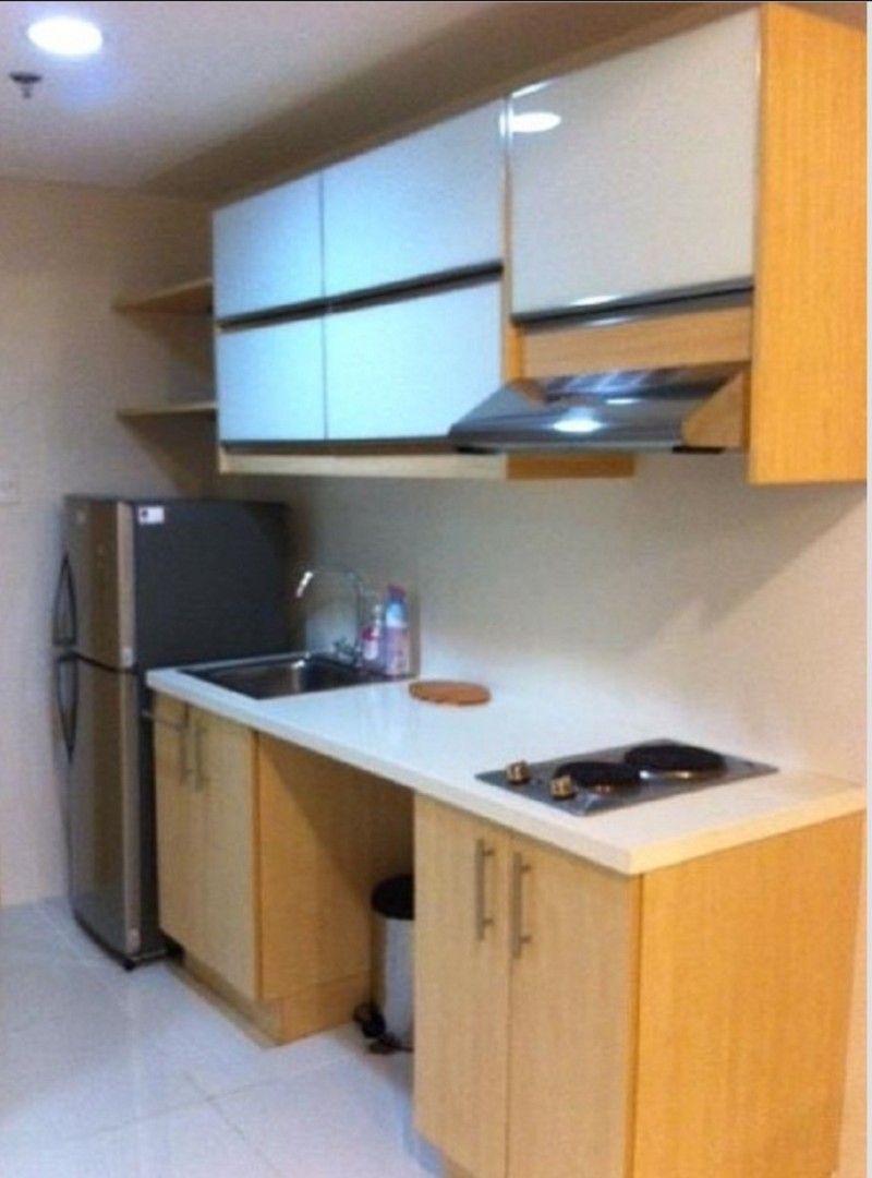 Taft Avenue Studio Unit for Sale (Category: Apartments & Condos) located in Pasig City. Submitted by raquel_mendoza (Listing ID 1464249944, Image 2). Description: 29 sqm fully furnished studio unit infront of the main gate of De La Salle (DLSU) at Taft Avenue. Complete with 2 single beds, aircon unit, dining table with 2 chairs, ref, big mirror, kitchen cabinets, stove counter top, rangehood bathroom accessories, glass shower partition and water 