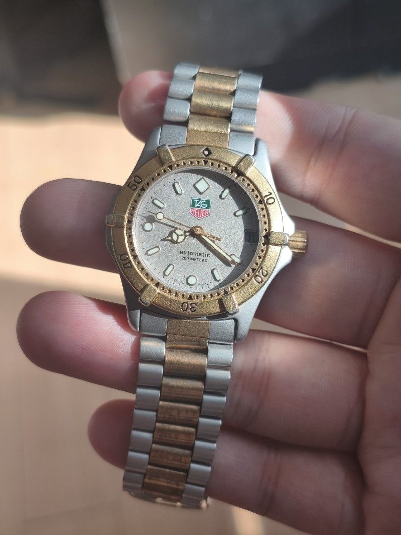 TAG Heuer 2000 Professional Authomatic (Category: Luxury Watches) located in Manila. Submitted by brick.owens (Listing ID 1464185969, Image 3). Description: TAG Heuer 2000 Series Professional ref no. 665.013F granite dial 35mm automatic unidirectional rotating bezel two-tone stainless steel unpolished in good condition considering age naked selling for only Php 35,000.