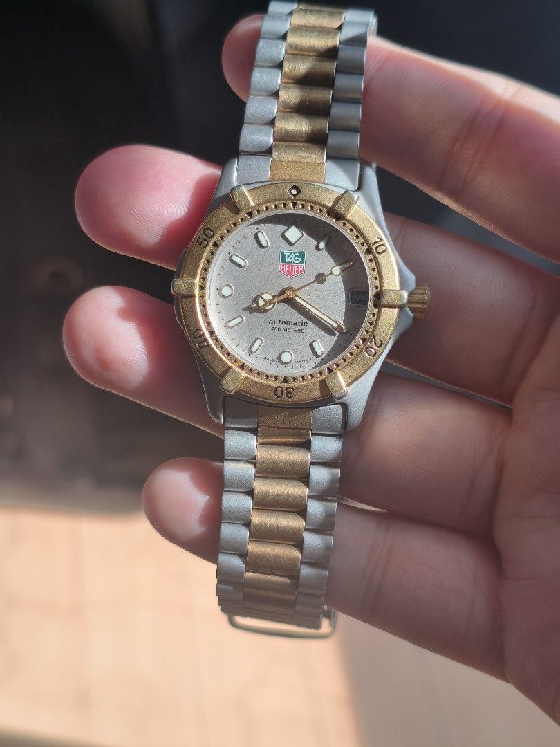 TAG Heuer 2000 Professional Authomatic (Category: Luxury Watches) located in Manila. Submitted by brick.owens (Listing ID 1464185969, Image 2). Description: TAG Heuer 2000 Series Professional ref no. 665.013F granite dial 35mm automatic unidirectional rotating bezel two-tone stainless steel unpolished in good condition considering age naked selling for only Php 35,000.