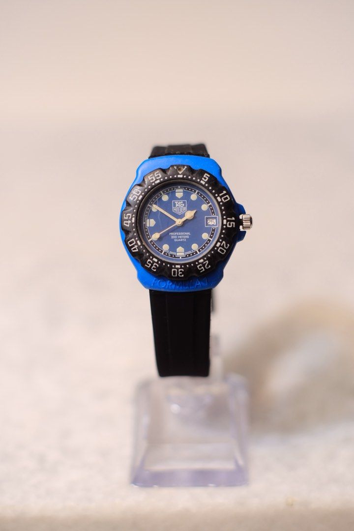 Tag Heuer Formula 1 “Nelson Piquet” (Category: Luxury Watches) located in Davao. Submitted by carussel (Listing ID 1464195221, Image 2). Description: Tag Heuer Formula 1 “Nelson Piquet” CASE: Matte blue case measures 37.5mm (w/crown, 36mm with) x 40mm. MOVEMENT: Heuer Calibre 4.87 hacking quartz movement, manufactured in 1994. Replacement Rubber Strap.