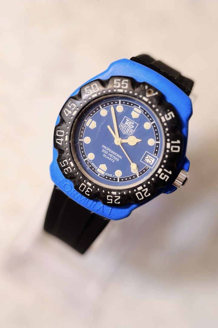 Tag Heuer Formula 1 “Nelson Piquet” (Category: Luxury Watches) located in Davao. Submitted by carussel (Listing ID 1464195221, Image 1). Description: Tag Heuer Formula 1 “Nelson Piquet” CASE: Matte blue case measures 37.5mm (w/crown, 36mm with) x 40mm. MOVEMENT: Heuer Calibre 4.87 hacking quartz movement, manufactured in 1994. Replacement Rubber Strap.