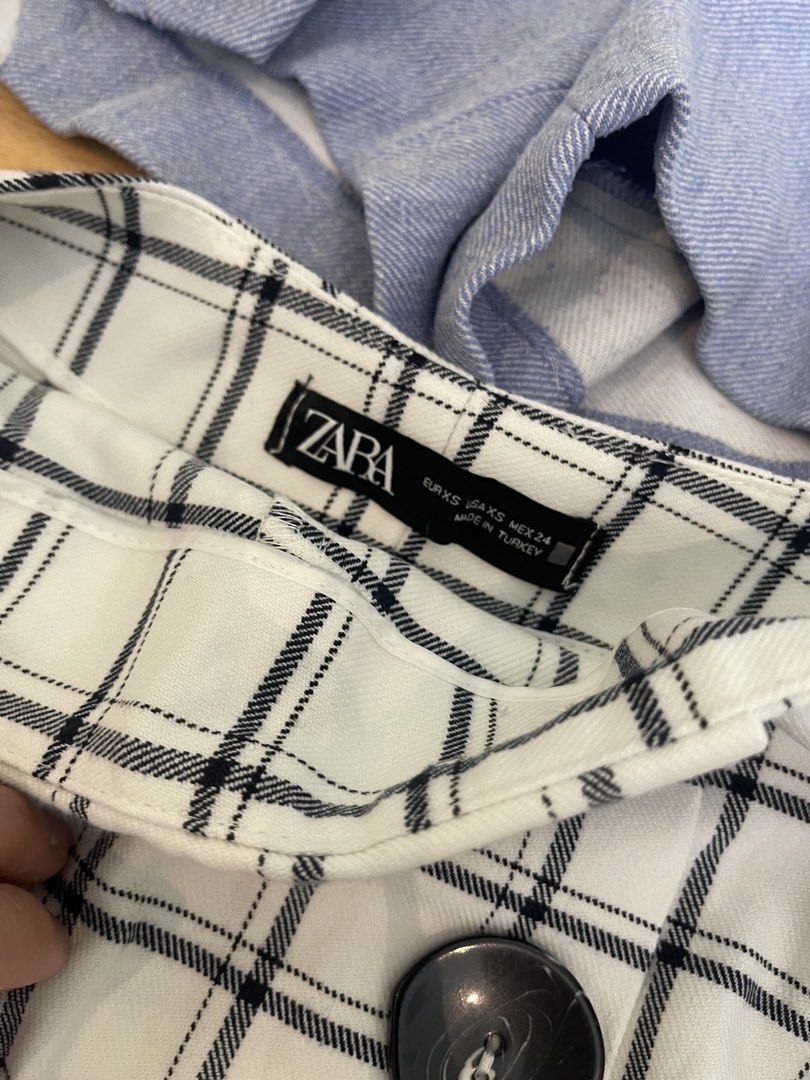 TAKE ALL- 5 Zara Skirts Bundle (XS-S) (Category: Skirts) located in Quezon City. Submitted by brightwolf_7ef5d3 (Listing ID 1464139002, Image 3). Description: - Bundle of 5 Zara skirts - Sizes: XS to S - Includes: Blue ruffled skirt, Red A-line skirt, Black & white checkered skirt, White textured skirt, Blue gingham wrap skirt with eyelet details - Versatile mix for various occasions.