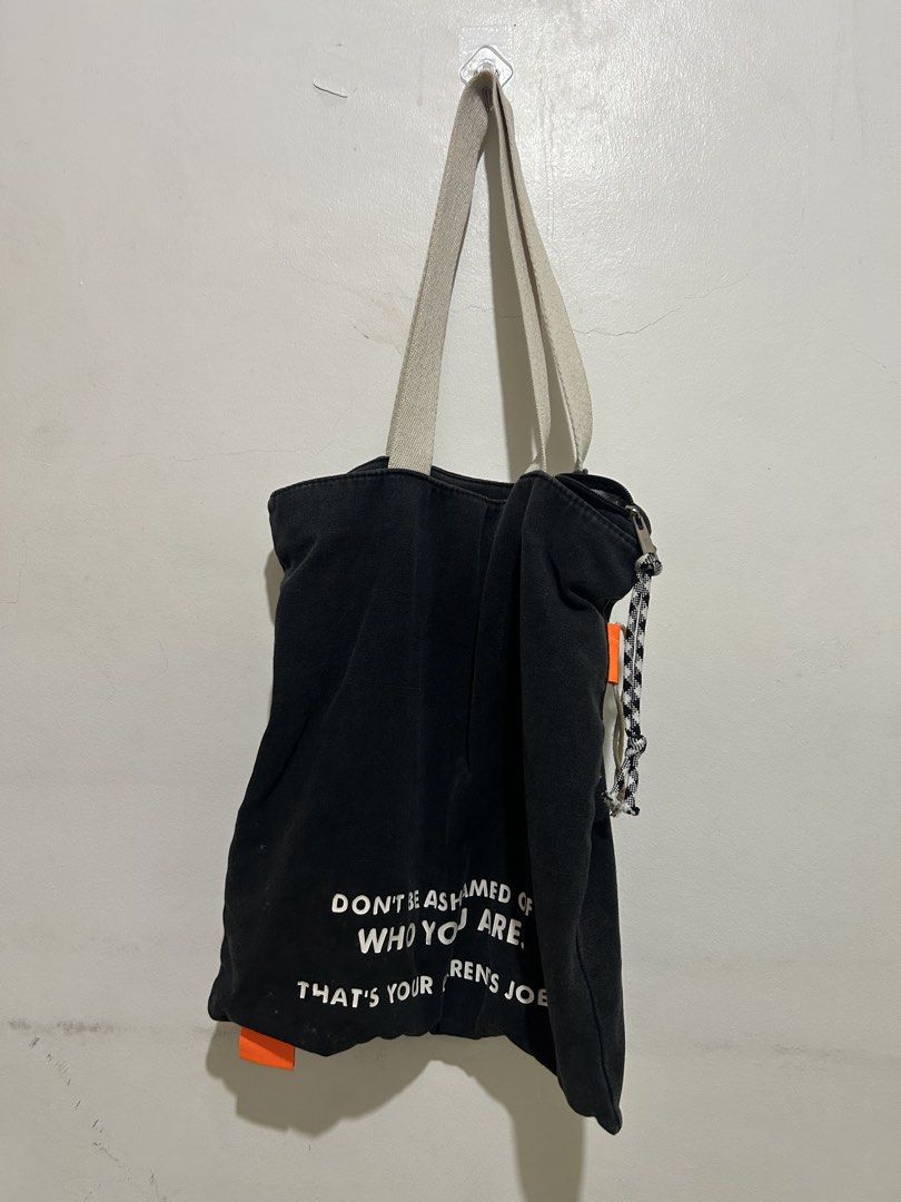 Take All Tote Bags (Category: Tote Bags) located in Muntinlupa City. Submitted by cheesecloth (Listing ID 1464139986, Image 3). Description: - Black canvas tote with graphic print and drawstring detail - White canvas tote with bicycle graphic - Cream-colored textured tote bag - Perfect for everyday use or as a stylish accessory.