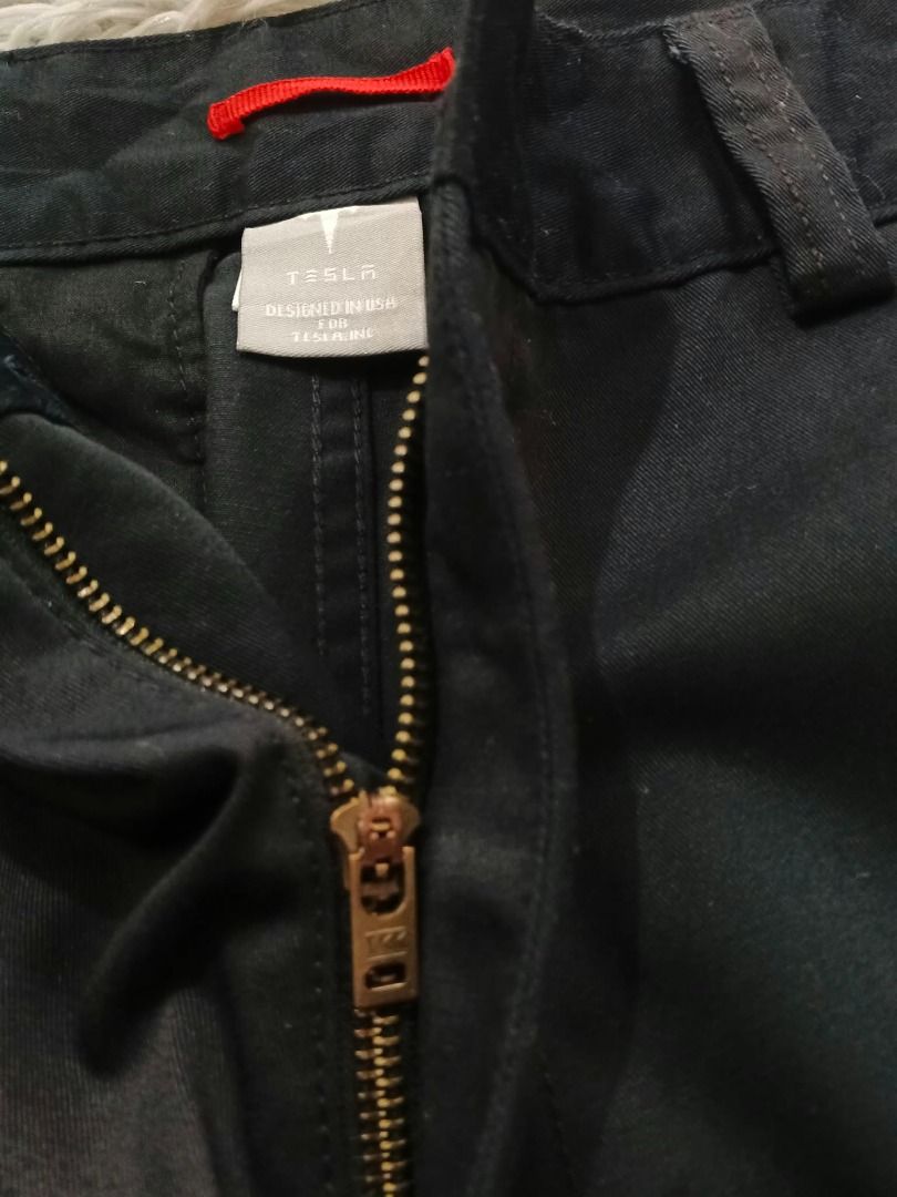 Tesla Mens 34x32 Black Cotton Polyester Work Pants (Category: Trousers) located in Pasig City. Submitted by oo7-thriftnflip-oo7 (Listing ID 1464245546, Image 1). Description: Chino Work Pants Tesla Official Employee Uniform Flat-front (para kang nka Dickies) Condition: Excellent/Pristine Color Rate: 9.5/10 Size on Tag: 34" Length: 43.5" Leg Opening: 9" No Issue Price: ₱950 +shipping fee.