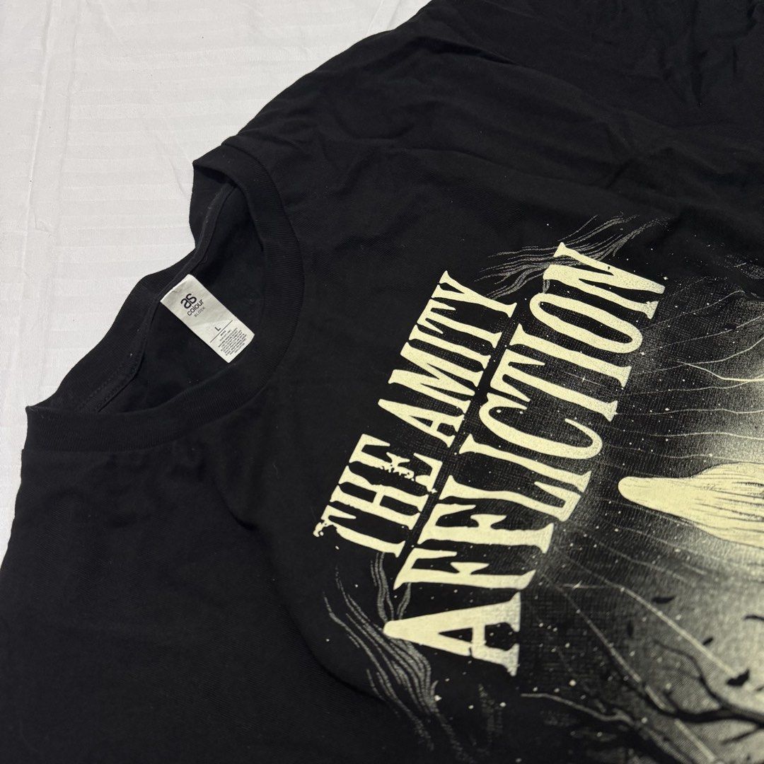 THE AMITY AFFLICTION (Category: Tshirts & Polo Shirts ) located in Pasig City. Submitted by jaaard (Listing ID 1464246553, Image 3). Description: The amity affliction aus tour 2022 Size L 22x30.5 Vgood condition need wash.