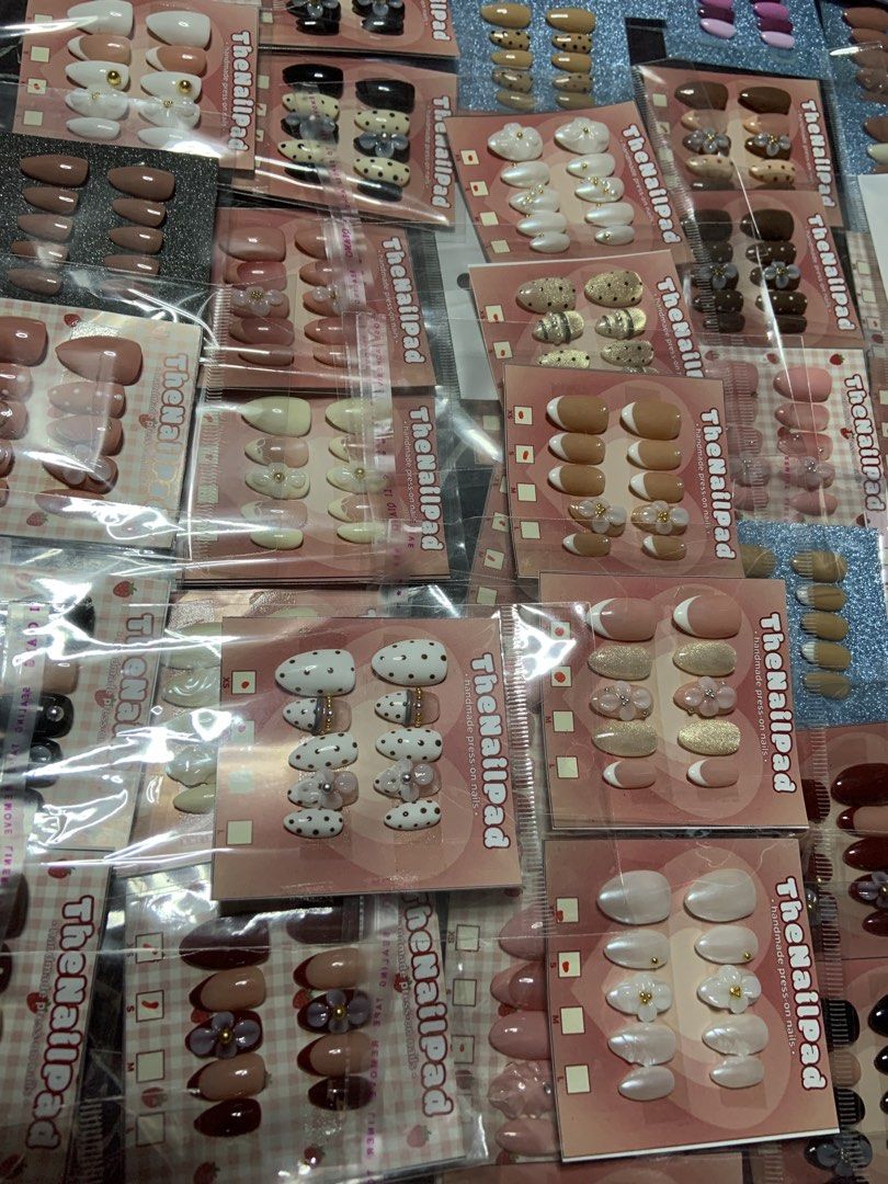 The Nail Pad Press-On Nails - Various Designs (Category: Hands & Nails) located in Manila. Submitted by thenailpadbyjers (Listing ID 1464272472, Image 1). Description: - Wide variety of press-on nail sets available. - Many styles and colors to choose from. - Features cute designs: polka dots, flowers, French tips, and more. - Perfect for a quick, beautiful manicure. - Ideal for experimenting with different nail looks. - All sets are individually 
