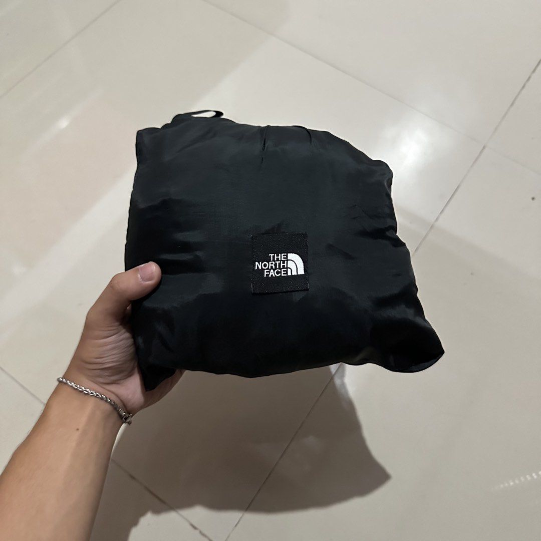The North Face Packable Outdoor Jacket (Category: Activewear) located in Irosin. Submitted by kylebri (Listing ID 1464166727, Image 3). Description: The North Face Outdoor Jacket Packable Hood good as new no issue medium 23w x 27L direct message me ! 📥.