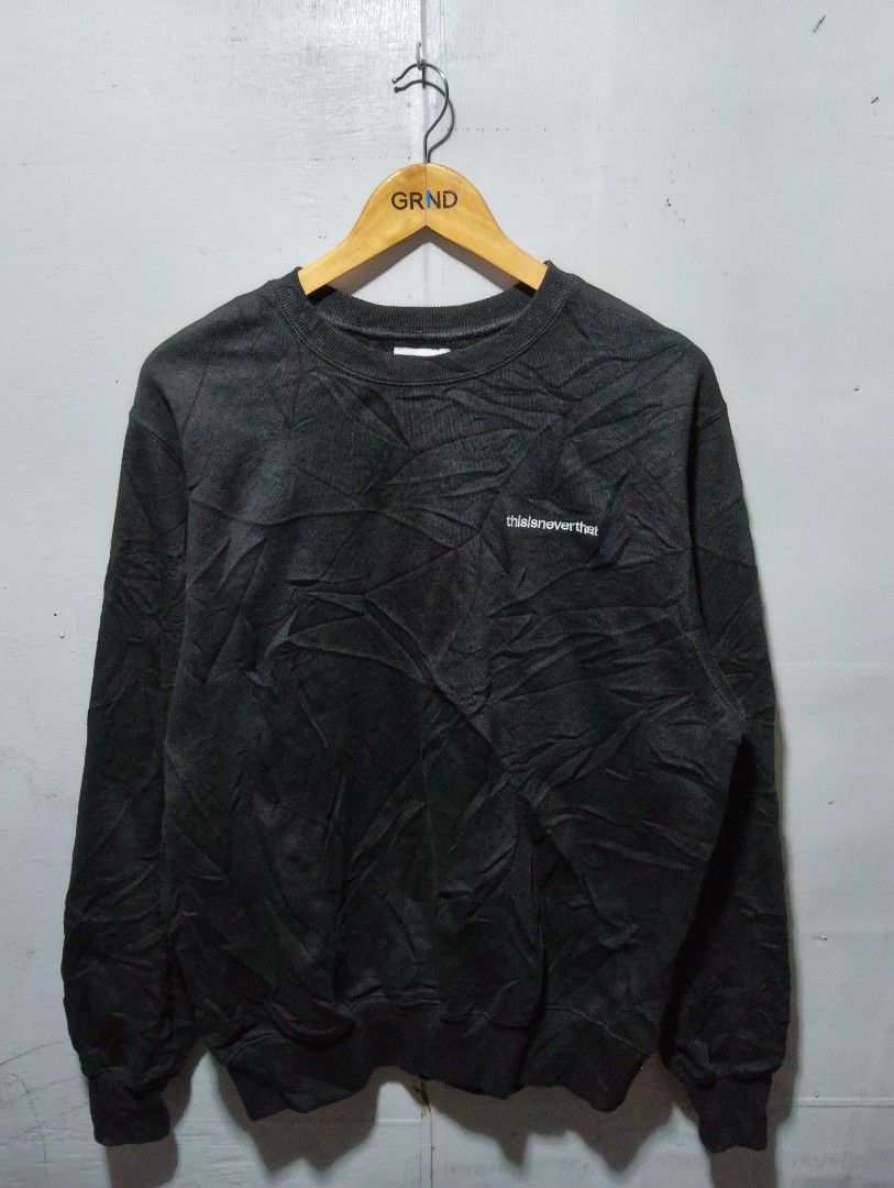 thisisneverthat International Crewneck Sweatshirt Black (Category: Coats, Jackets and Outerwear) located in Manila. Submitted by daledemata51026 (Listing ID 1464202161, Image 1). Description: - Brand: thisisneverthat - Color: Black - Style: Crewneck Sweatshirt - Features: Embroidered brand name on left chest - Back Graphic: Large 'thisisneverthat INTERNATIONAL' embroidery - Occasion: Casual wear - Comfort: Comfortable and stylish - Size: Small on