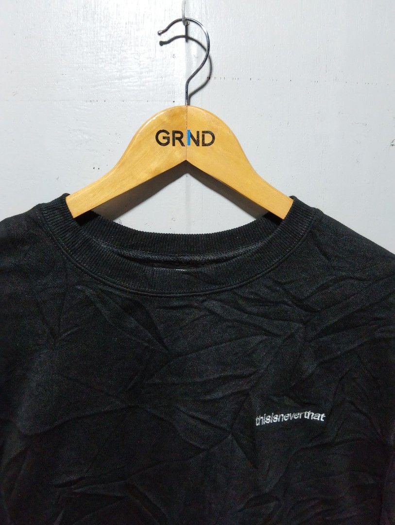 thisisneverthat International Crewneck Sweatshirt Black (Category: Coats, Jackets and Outerwear) located in Manila. Submitted by daledemata51026 (Listing ID 1464202161, Image 3). Description: - Brand: thisisneverthat - Color: Black - Style: Crewneck Sweatshirt - Features: Embroidered brand name on left chest - Back Graphic: Large 'thisisneverthat INTERNATIONAL' embroidery - Occasion: Casual wear - Comfort: Comfortable and stylish - Size: Small on