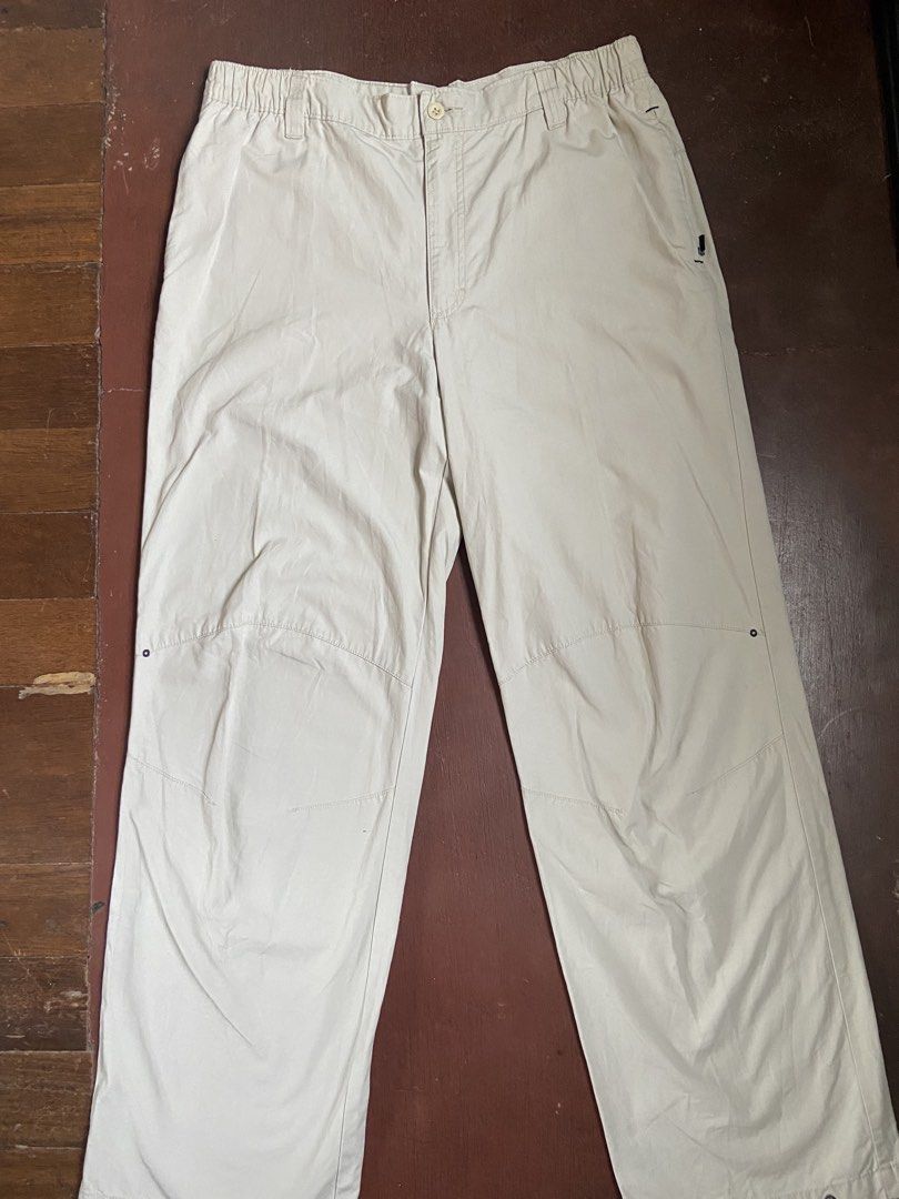 Timberland Beige Cargo Pants (Category: Jeans) located in Manila. Submitted by mavcl (Listing ID 1464171620, Image 1). Description: - Beige Timberland cargo pants - Elastic waistband with button closure - Multiple pockets, including a zippered side pocket - Adjustable ankle cuffs - Ideal for outdoor activities or casual wear - Comfortable fit .