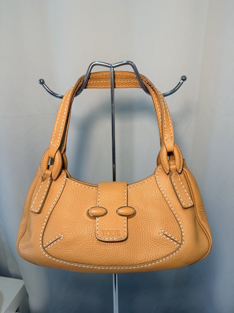 Tod’s authentic pebbled shoulder bag (Category: Luxury Bags & Wallets) located in Muntinlupa City. Submitted by atelier.archive (Listing ID 1464194208, Image 1). Description: - guaranteed authentic - money back if proven fake - can send more photos upon requests for sure buyers -no refunds/exchange - no bogus buyers - lowball offers will NOT be entertained .