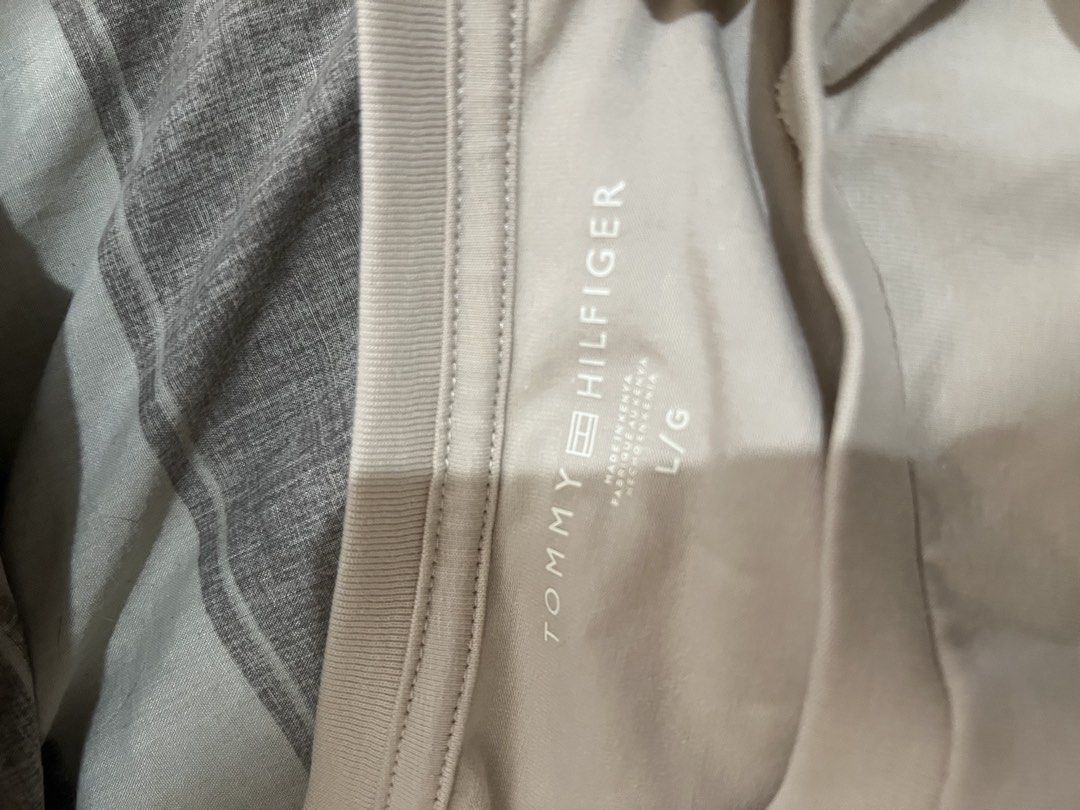 Tommy Hilfiger Crew neck T-Shirt (Category: Shirts) located in Paranaque City. Submitted by ekkostarfall.12902 (Listing ID 1464212621, Image 3). Description: - Brand New - Color: Beige - Size: Large - Quick dry - with tags MOP: Maya, Bank transfer SF shouldered by buyer Location: Parañaque.