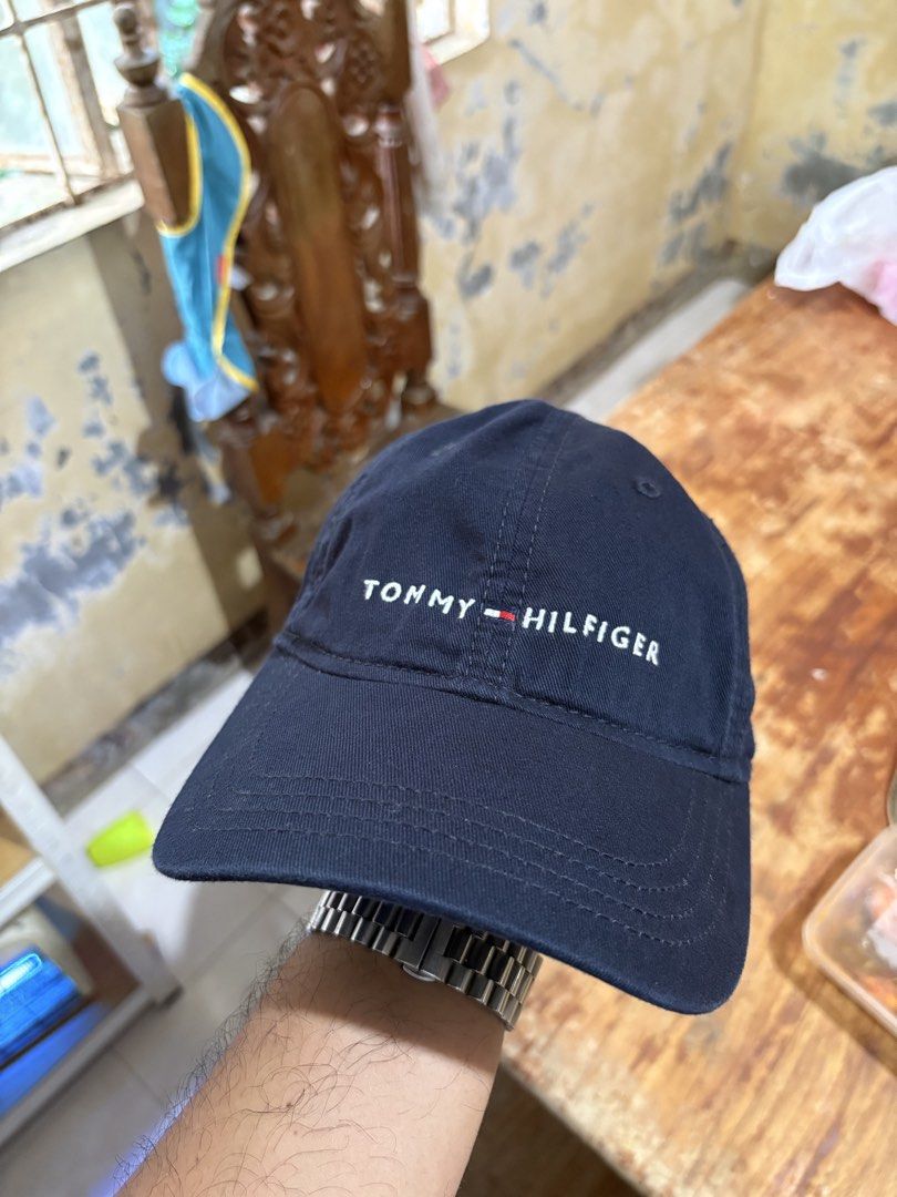 Tommy Hilfiger Navy Blue Cap (Category: Caps & Hats) located in Manila. Submitted by rmedz (Listing ID 1464209944, Image 1). Description: - Classic navy blue Tommy Hilfiger cap - Iconic embroidered logo on the front - Adjustable strap with metal buckle for a custom fit - Made in Bangladesh - Ideal for everyday wear and casual styling.