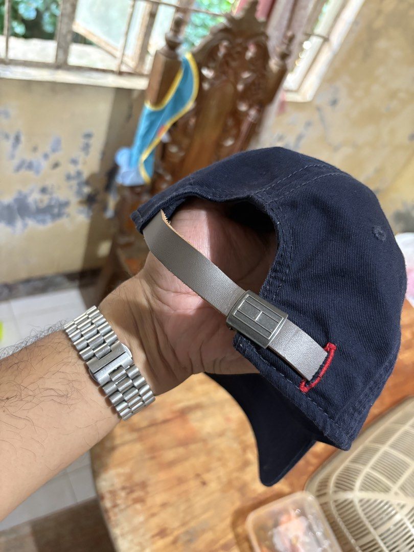 Tommy Hilfiger Navy Blue Cap (Category: Caps & Hats) located in Manila. Submitted by rmedz (Listing ID 1464209944, Image 2). Description: - Classic navy blue Tommy Hilfiger cap - Iconic embroidered logo on the front - Adjustable strap with metal buckle for a custom fit - Made in Bangladesh - Ideal for everyday wear and casual styling.