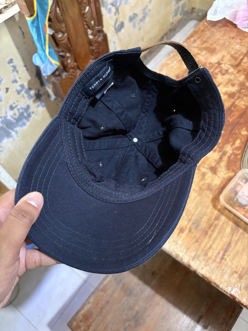 Tommy Hilfiger Navy Blue Cap (Category: Caps & Hats) located in Manila. Submitted by rmedz (Listing ID 1464209944, Image 3). Description: - Classic navy blue Tommy Hilfiger cap - Iconic embroidered logo on the front - Adjustable strap with metal buckle for a custom fit - Made in Bangladesh - Ideal for everyday wear and casual styling.